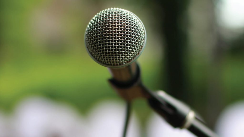 Selective focus photography of microphone - fi